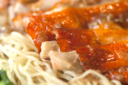 Duck noodle soup on tableの写真素材