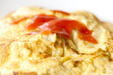 Omelette with chilli suaceの写真素材