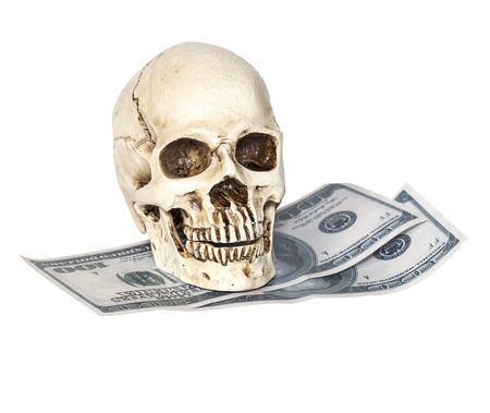 Human skull on dollar buck isolatedの写真素材