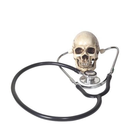 human skull and stethoscope on white backgroundの写真素材