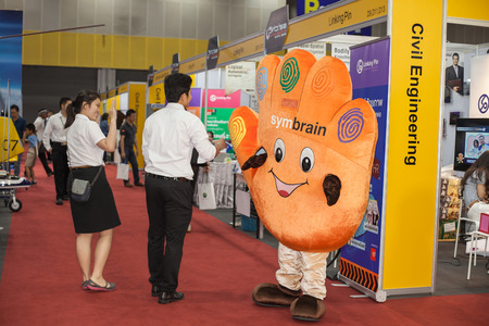 BANGKOK ,THAILAND - JULY 18: mascot cartoon hi five hand at Engineering Expo 2015 , on JULY 18, 2015 in Bangkok, Thailand.のeditorial素材
