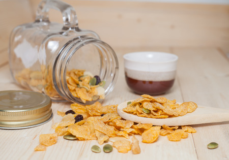 Cornflakes Caramel with milk. Selective focus, shallow DOF
