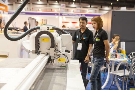 BANGKOK - AUGUST 29 : Drawing and cutting machines at Pack Print and T-PLAS THAILAND on Aug 29,2015 in BITEC ,Bangkok, Thailand.のeditorial素材