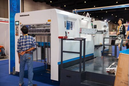 BANGKOK - AUGUST 29 :cutting paper terminal machine at Pack Print and T-PLAS THAILAND on Aug 29,2015...