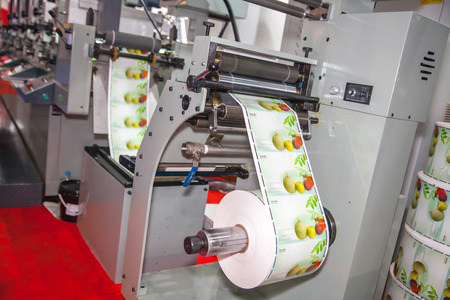 BANGKOK - AUGUST 29 :printting on sticker roll machine at Pack Print and T-PLAS THAILAND on Aug 29,2015 in BITEC ,Bangkok, Thailand.のeditorial素材