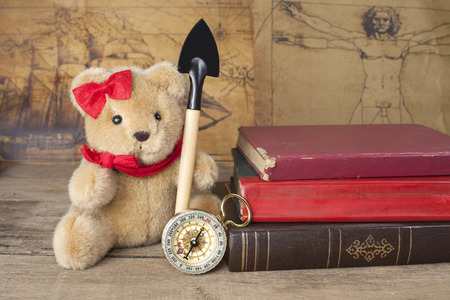Vintage compass and bear toyの写真素材