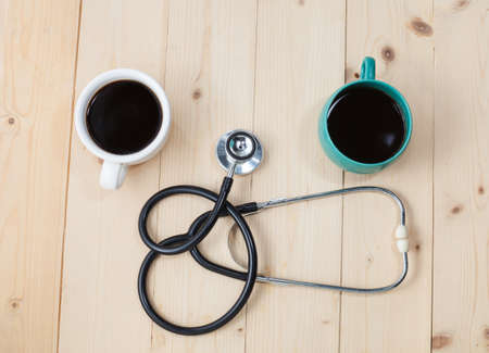 coffee cup and stethoscope, relaxing concept for doctorの写真素材