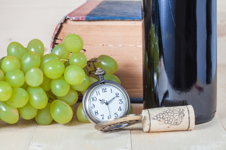 green grape and wine bottleの写真素材