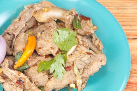 Hot and spicy pock mixing with herb.の写真素材