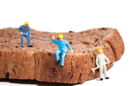 miniature model figure of a foreman direction with 
bread,selective focusの写真素材
