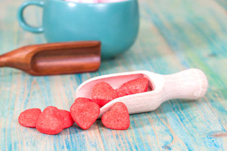 red heart on wooden spoon as symbol of love, valentines and happinessの写真素材