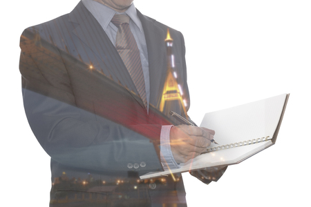 Double exposure of Night city and business manの写真素材