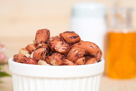 Tiger peanut in bowl on wood table