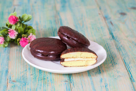 chocolate Sponge sandwich pie on wood table