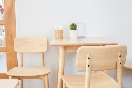 Tables and chairs at intdoorsの写真素材