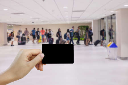 blank card in hand with a journey trip backgroundの写真素材