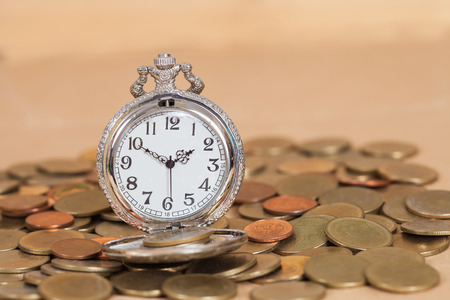 Business Money Concept Idea, Clock and Coinsの写真素材