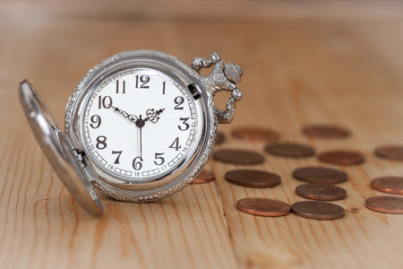 Business Money Concept Idea, Clock and Coins