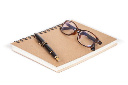 Diary with  pen  on white backgroundの写真素材