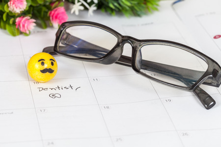 Reminder "Dentist appointment" in calendarの写真素材