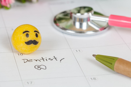 Reminder "Dentist appointment" in calendarの写真素材