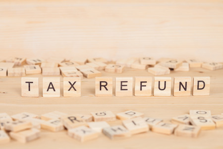 Tax Refund word written on wood cubeの写真素材