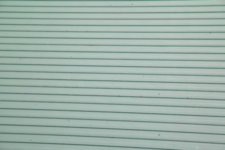 old zine metal wall with dirty and rusty backgroundの写真素材