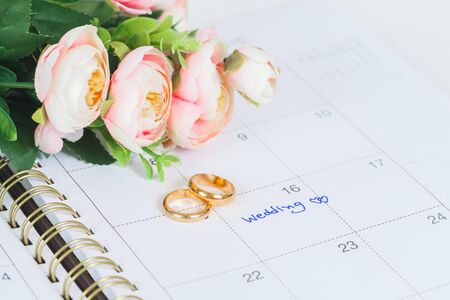 Wedding note on a calendar sets a reminder for the wedding 
dayの写真素材