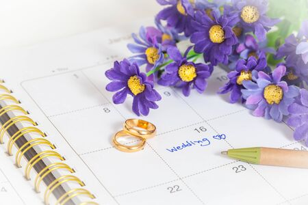 Wedding note on a calendar sets a reminder for the wedding 
dayの写真素材