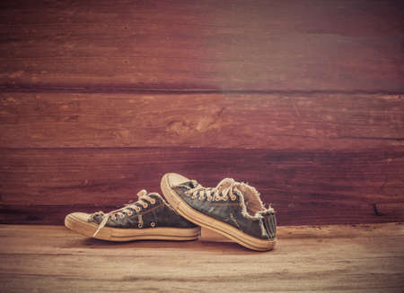 still life old shoes on woodの写真素材