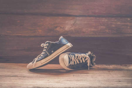 still life old shoes on woodの写真素材