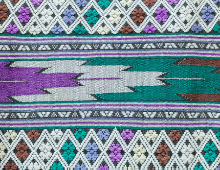 folk traditional fabric pattern backgroundの写真素材