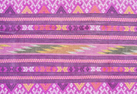 folk traditional fabric pattern backgroundの写真素材