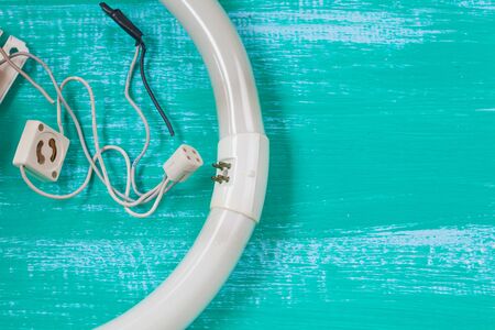 repair fluorescent light and tool on woodの写真素材