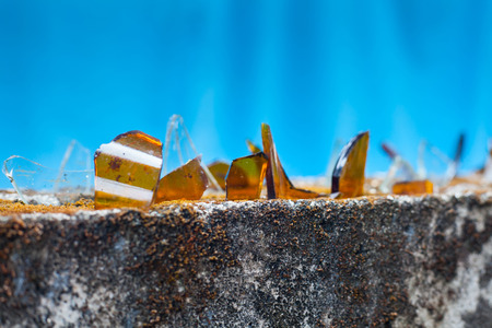 broken glass on fence ,to protect from stolen.の写真素材