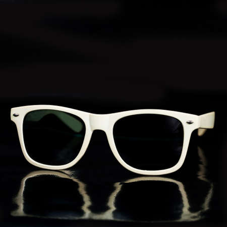 modern sunglasses on white background .