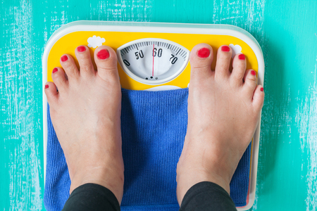 Human feet stand on Weight Scale  ,healthcare conceptの写真素材