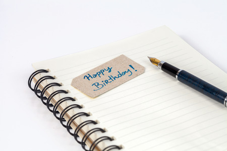 wording tag with fountain pen on bookの写真素材