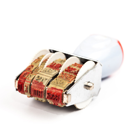 old stamper tool on white backgroundの写真素材