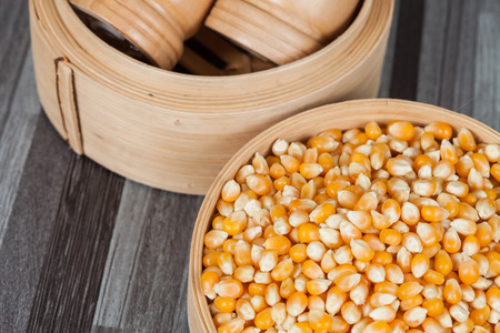 Corn seed in a bamboo basketの写真素材