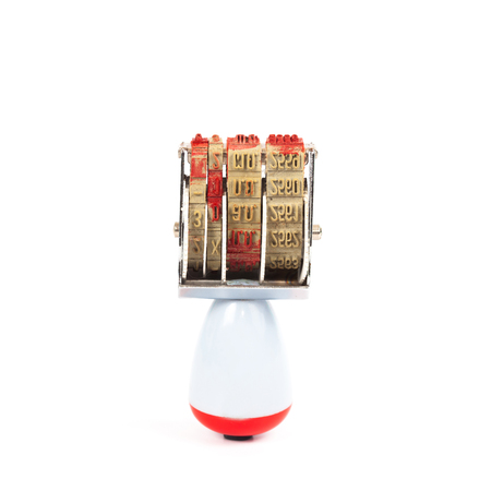 old stamper tool on white backgroundの写真素材