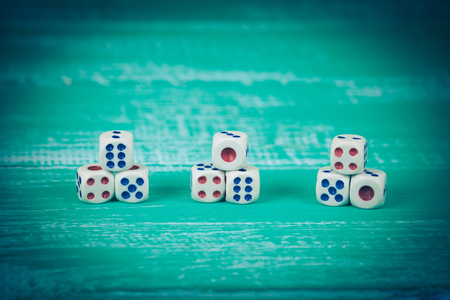 dice on wood backgroundの写真素材