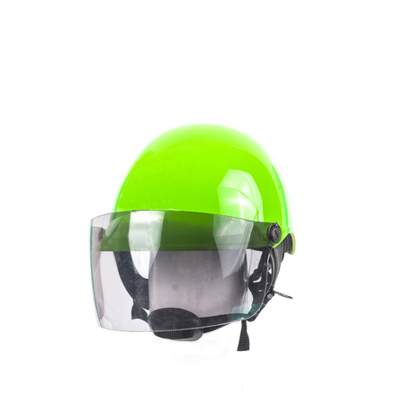 green helmet for motorcycle on white backgroundの写真素材