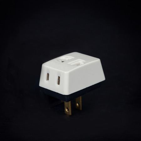three way plug  for home electric on background