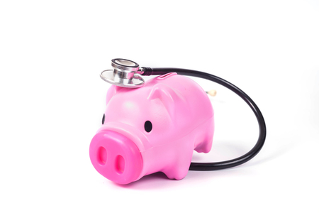 piggy bank with stethoscope in save health concept .の写真素材
