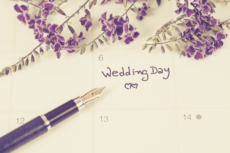 Reminder Wedding day in calendar planning and fountainの写真素材