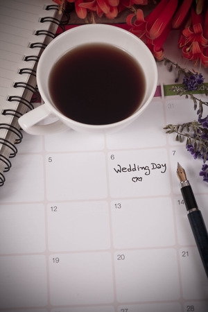 Reminder Wedding day in calendar planning and fountainの写真素材