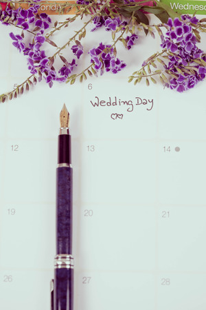 Reminder Wedding day in calendar planning and fountainの写真素材