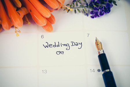 Reminder Wedding day in calendar planning and fountainの写真素材