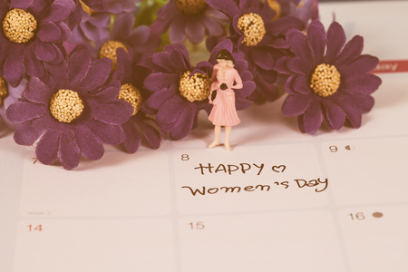 Happy women's day note on calendar book.の写真素材
